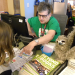 Child getting help at a library service desk
